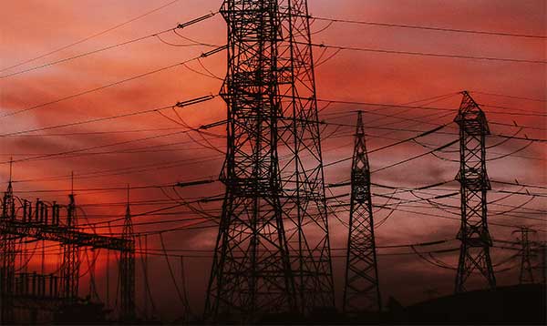 Power to Choose Lowest Electricity Rates AEP Texas - powerlines at dawn photo