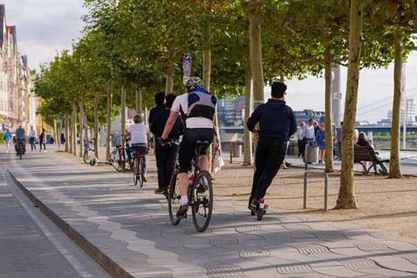 EV Program People in Park Jogging and on Bikes EV Program People in Park Jogging and on Bikes