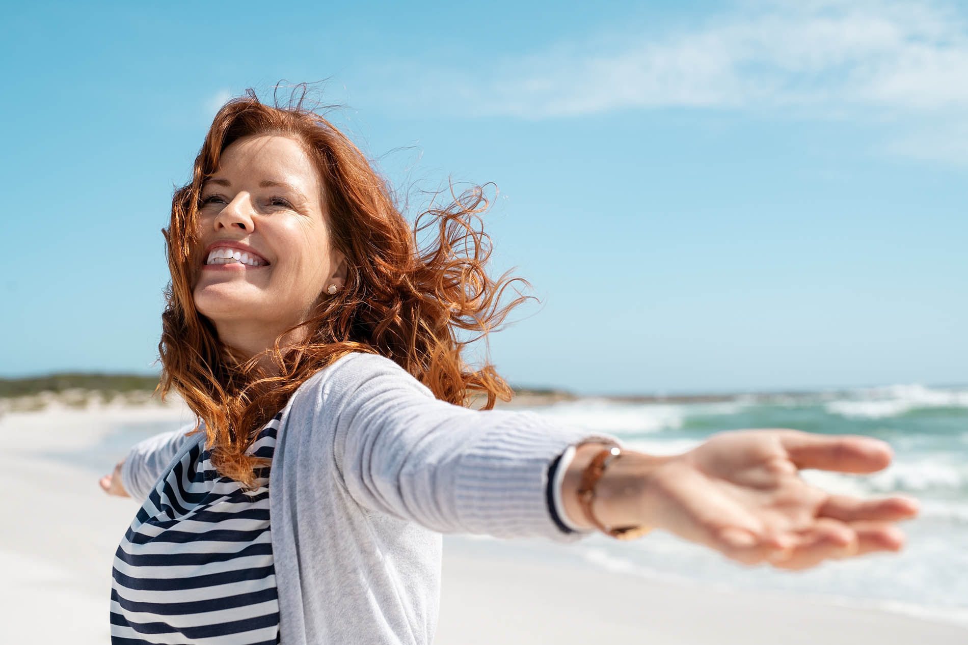 Understanding Potential Energy Woman on Beach