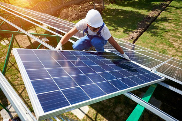 Solar Panels Man Installs Over Grid
